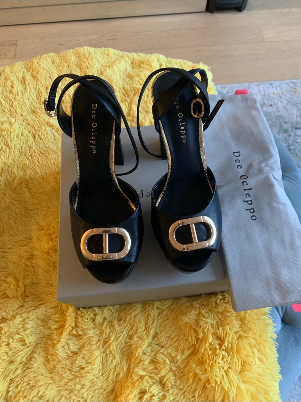 Dee Ocleppo Black Leather Open-Toe Heeled Sandals with Gold Buckle
